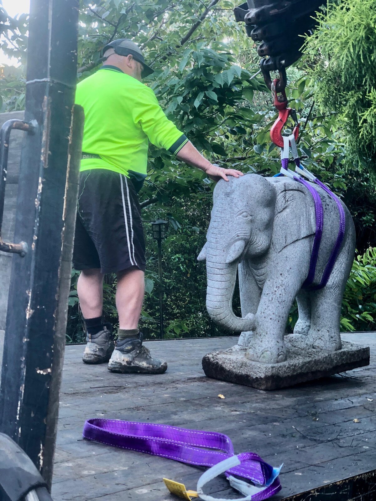 CDT Transport HIAB crane lifting a heavy stone sculpture, Wellington